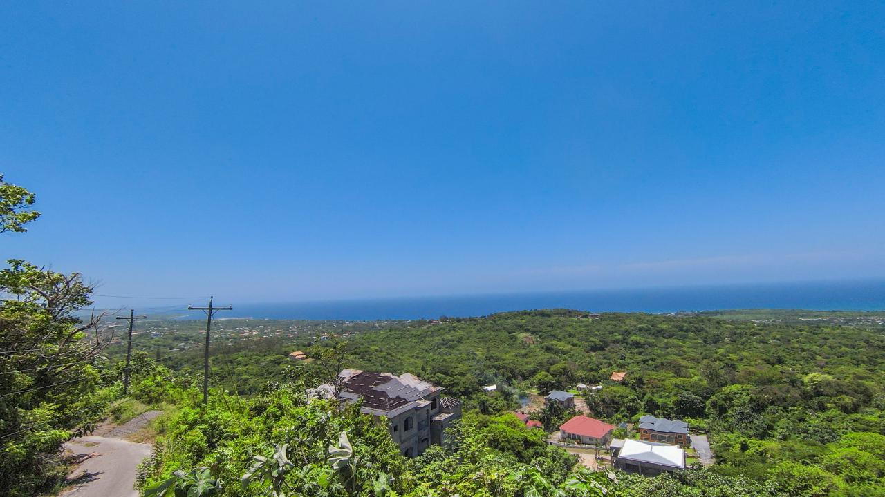 MCEACHRON & CLARKE REAL ESTATE - Residential Lot for Sale USD $150000 -  Runaway Bay in St. Ann